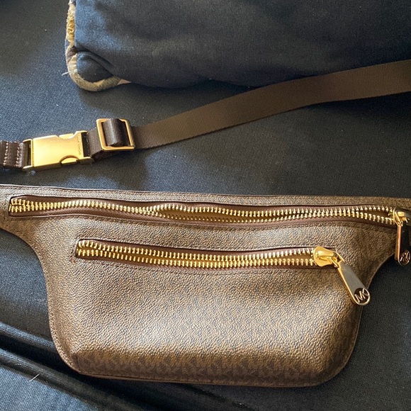 Michael Kors' belt bag in a contemporary logo-print design. - Picture 1 of 4